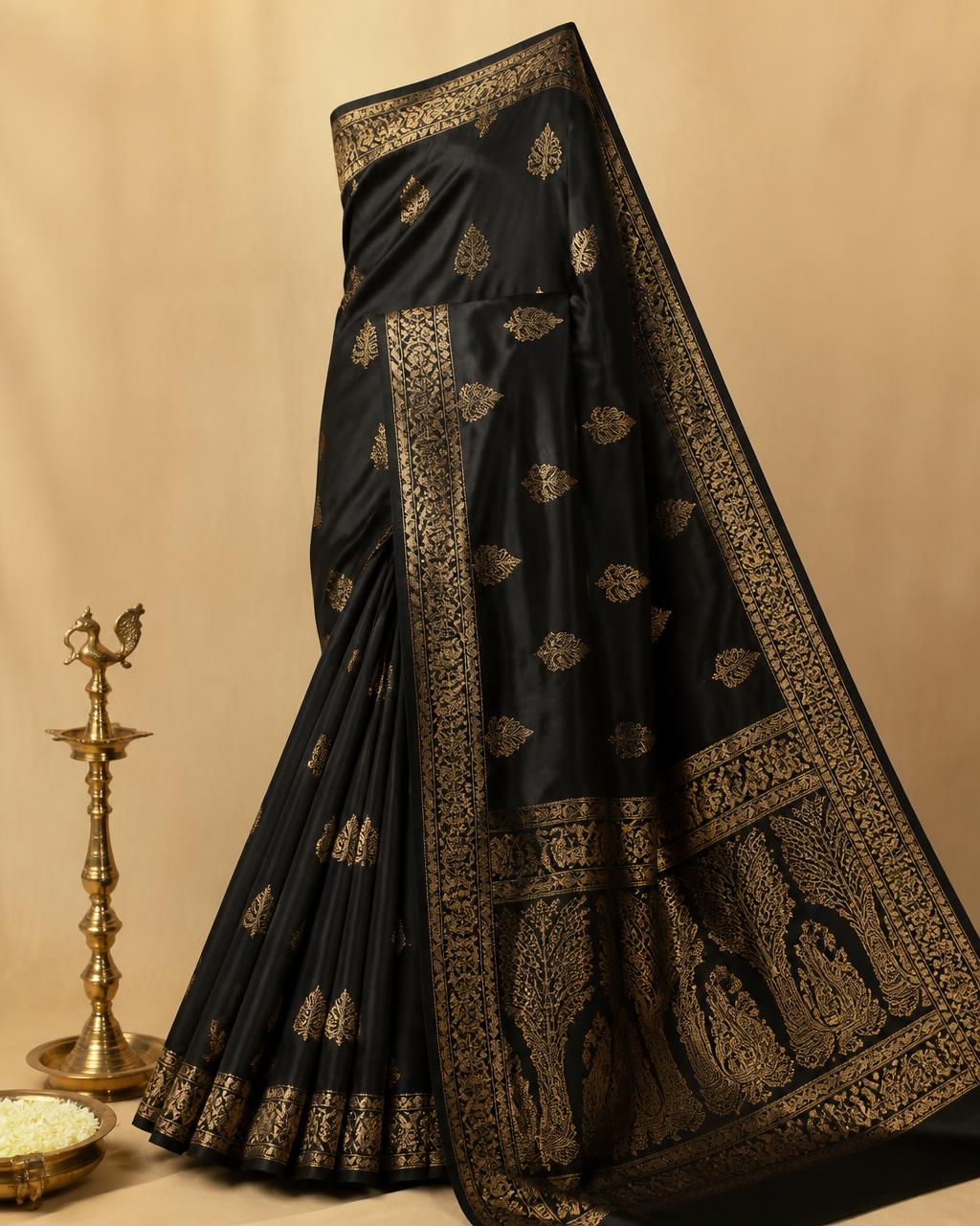 Black and gold Kanjeevaram saree showcasing Elora Sarees craftsmanship